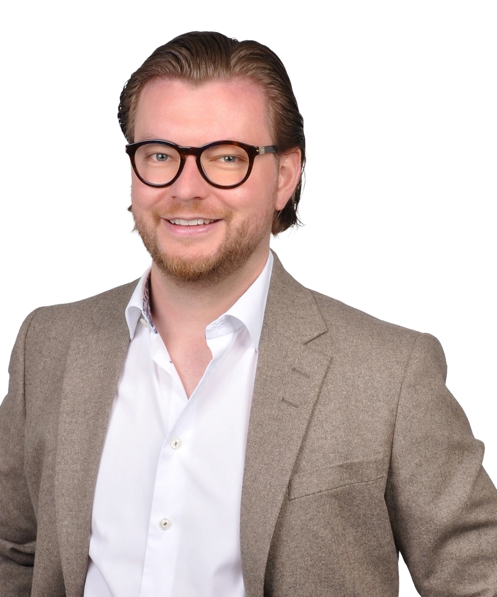 Porträt von Tom Hennies